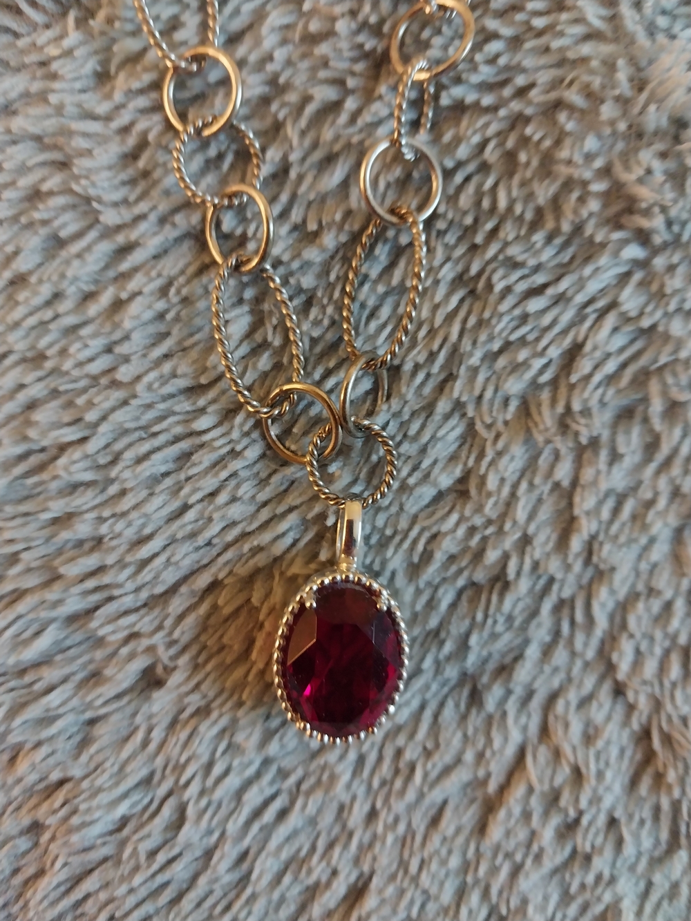 Elegant Sterling Silver Necklace with Deep Red Gem Pendant